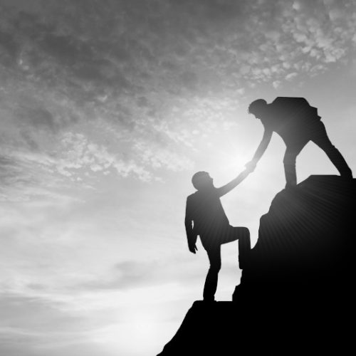 Business team success concept.silhouette of business man on peak Business team success concept.silhouette of business man on peak